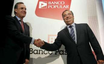 José María Arias y Ángel Ron tras el acuerdo que permitió a Banco Popular absorber a Banco Pastor