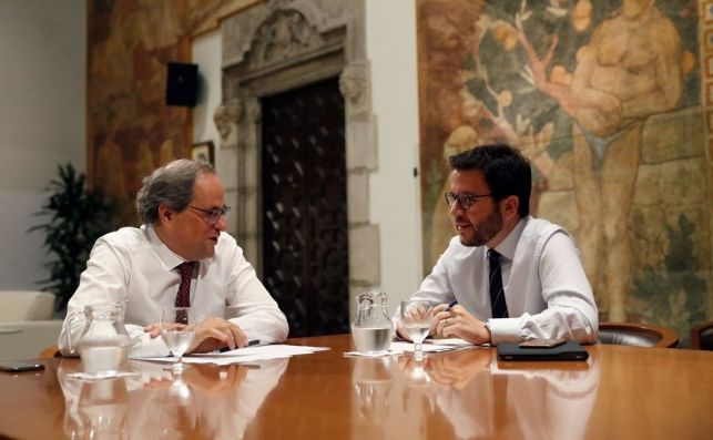 El presidente de la Generalitat, Quim Torra, y su vicepresidente, Pere Aragonès, durante la reunión que han mantenido este viernes en el Palau de la Generalitat