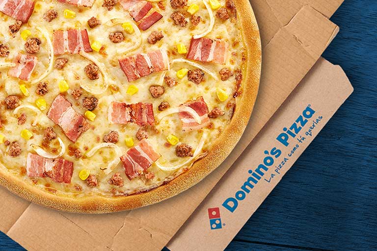 Warren Buffett se decanta por elevar su inversión en la cadena de comida rápida Domino's Pizza en un 86,49%. Foto: Domino's Pizza.