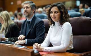 La presidenta de la Comunidad de Madrid, Isabel Díaz Ayuso, y el consejero de Presidencia, Miguel Ángel García Martín, durante un pleno en la Asamblea de Madrid.